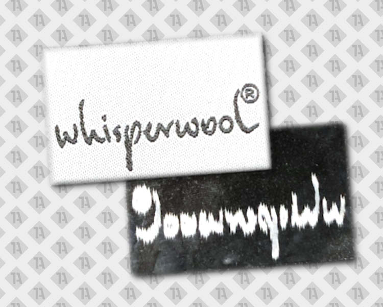 Label gewebt mit Laserschnitt schwarz weiß Schriftzug